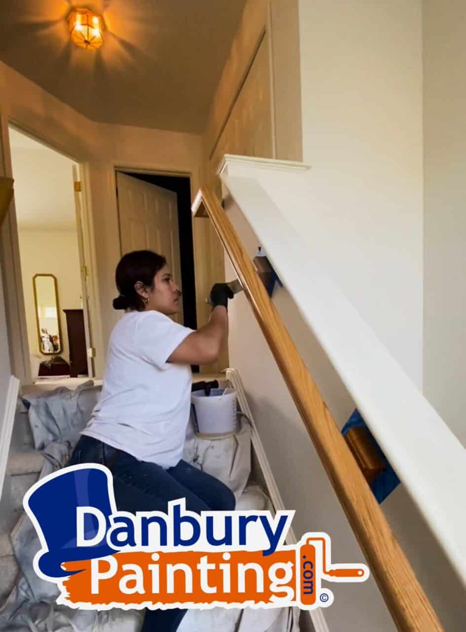 Woman Painting and set of Hand Rails in Danbury, CT.